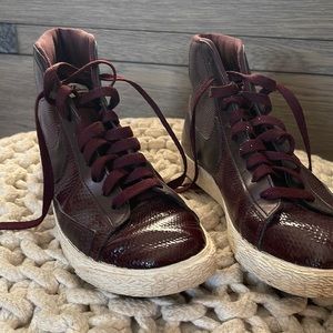 Women’s size 8 Nike high top sneakers maroon color textured leather